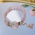 Pink crystal women's bracelet with peace buckle design and adjustable safety buckle closure