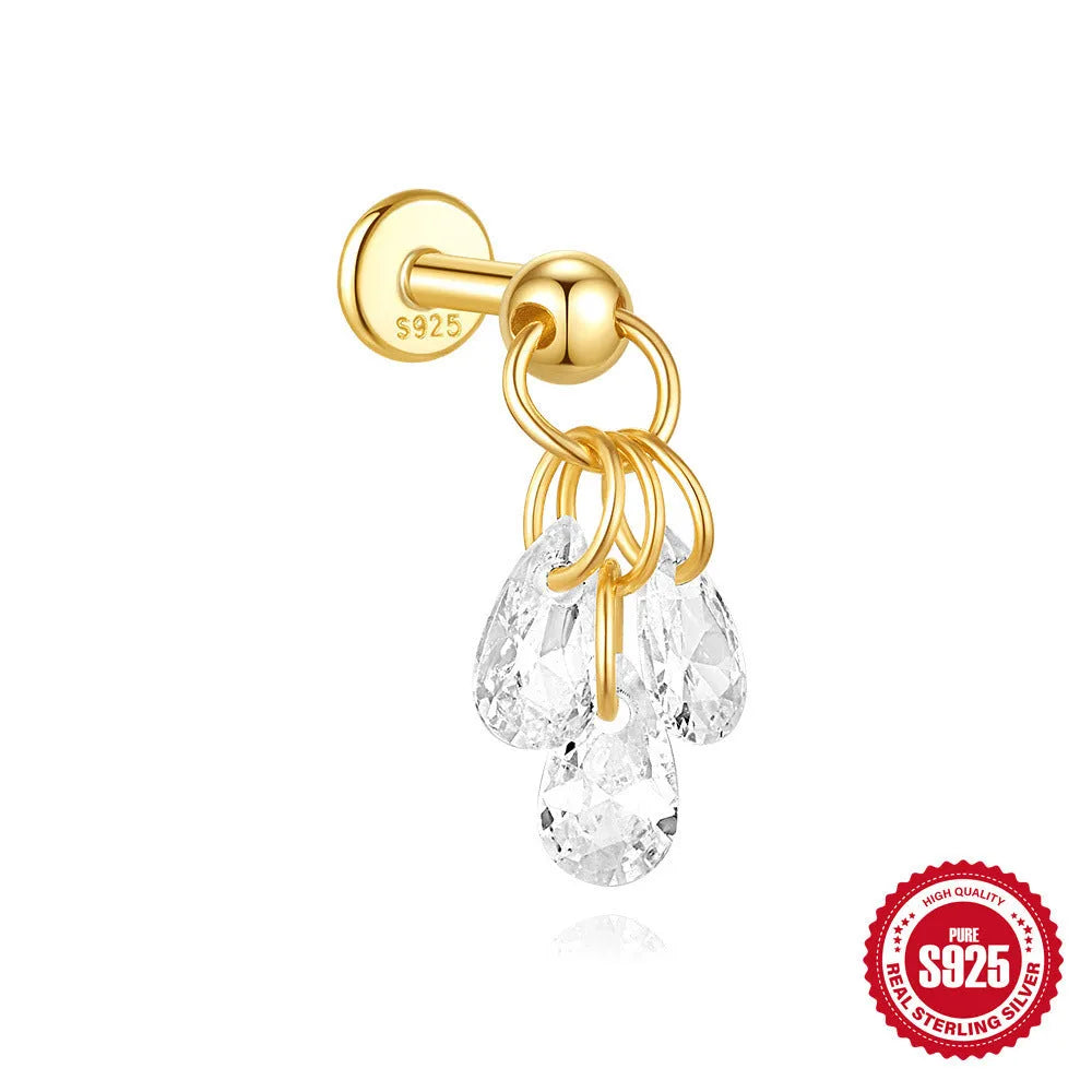S925 sterling silver moon earring with a small diamond set in a star design on a gold-toned background.