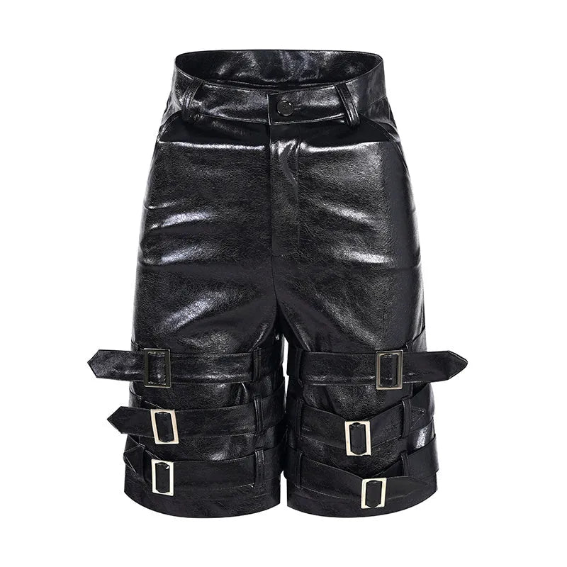 Men's black casual cropped shorts with a prominent leather ring detail on the front.
