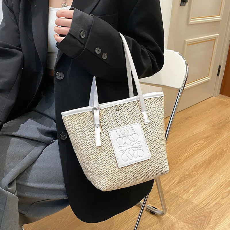 Straw woven women's shoulder bag with horizontal square shape and three-dimensional pocket