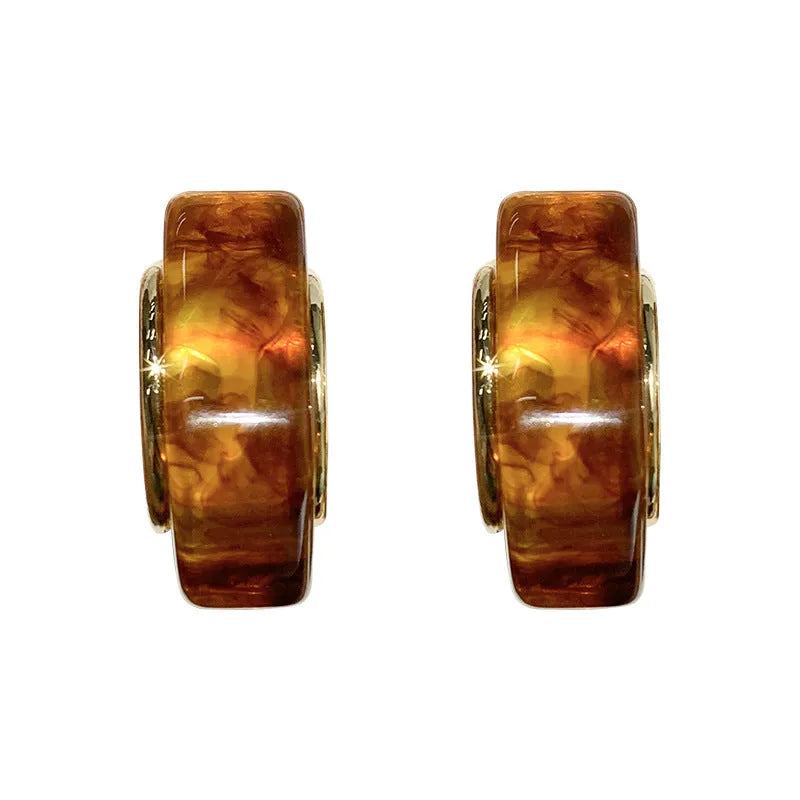 Simple Retro amber resin drop dangle earrings Style1, lightweight, approx 3.5 cm length, warm translucent colour, on neutral background