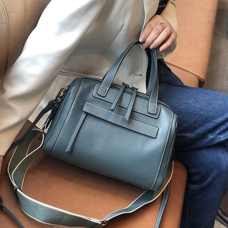 Genuine leather shoulder messenger bag with lychee pattern texture in horizontal square shape showing interior organisation compartments