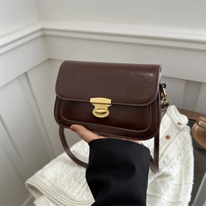 Soft PU leather small square handbag in horizontal rectangular shape showing black colour option