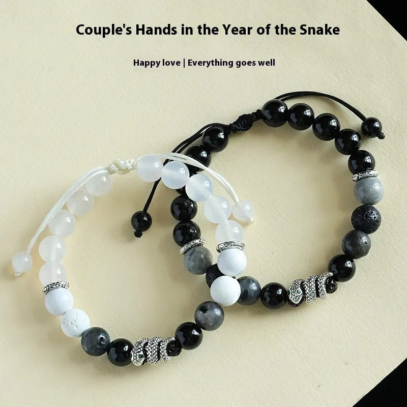 Black and white agate couple bracelet with blessing snake design and turquoise glitter