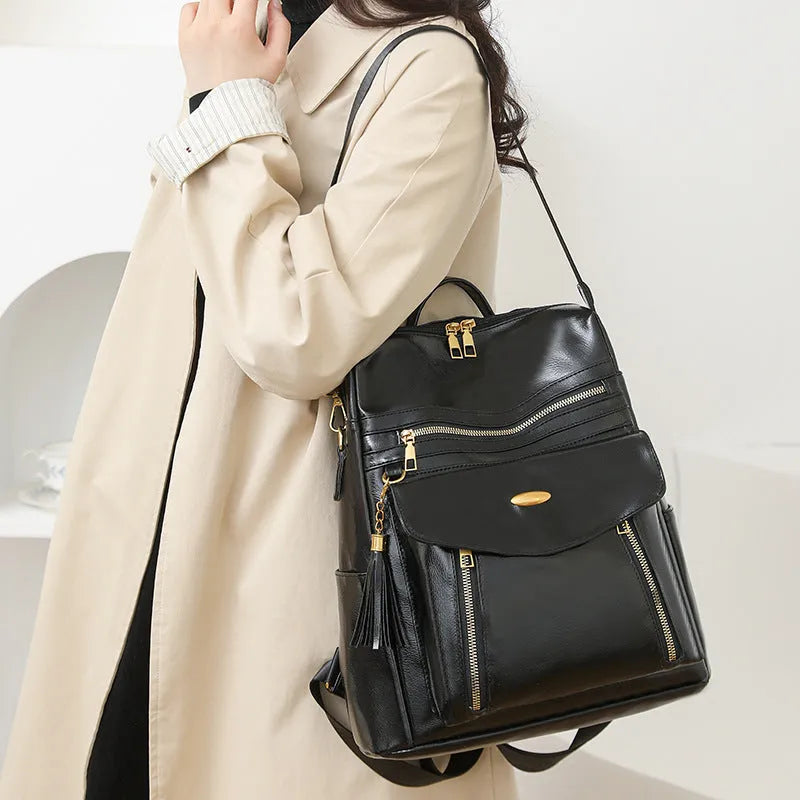 Crossbody casual ladies backpack in brown PU with sewing thread design and phone pocket