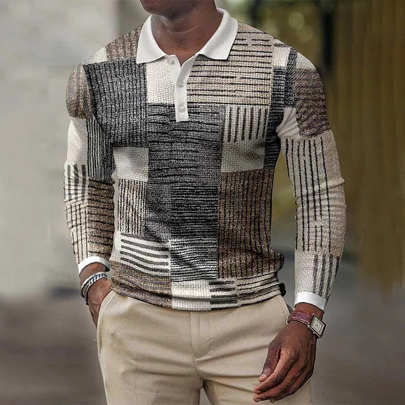 Man wearing a grey striped long-sleeved top with a textured 3D printed pattern