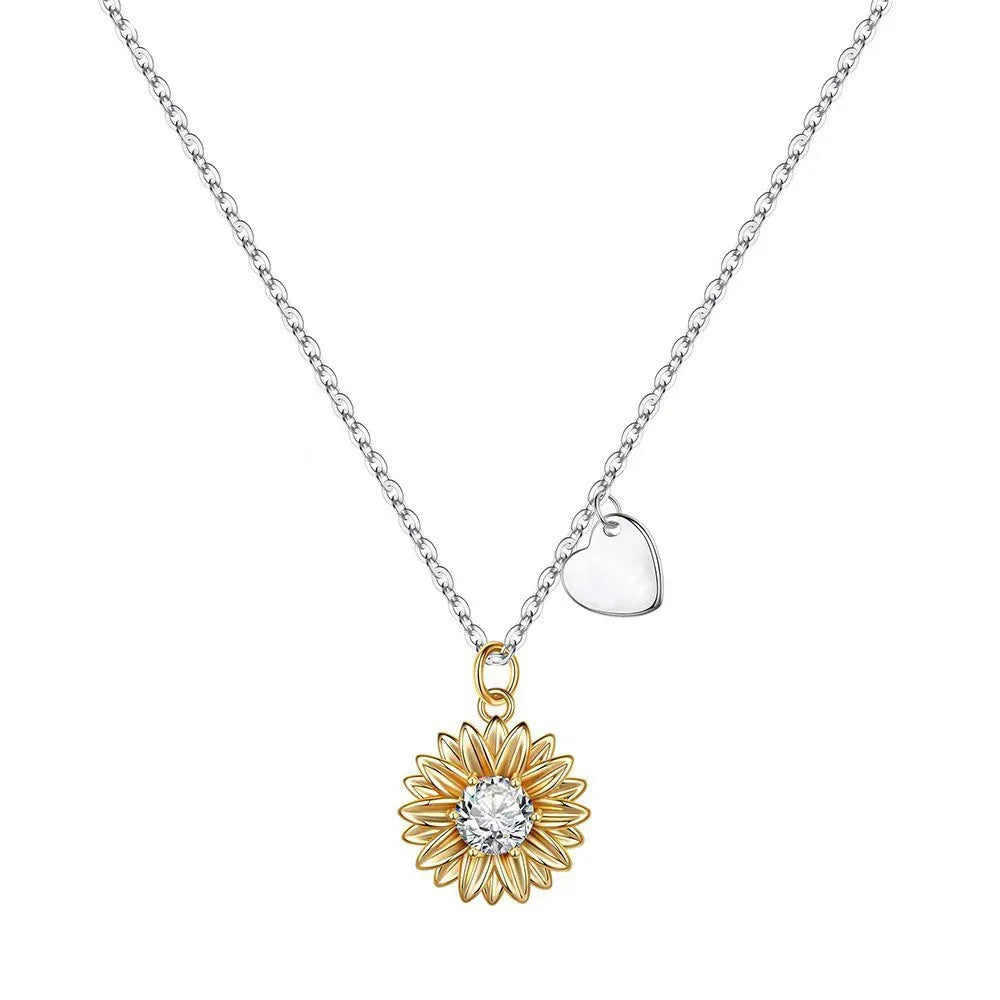 Geometric sunflower daisy pendant necklace on a silver cross chain, adjustable length.