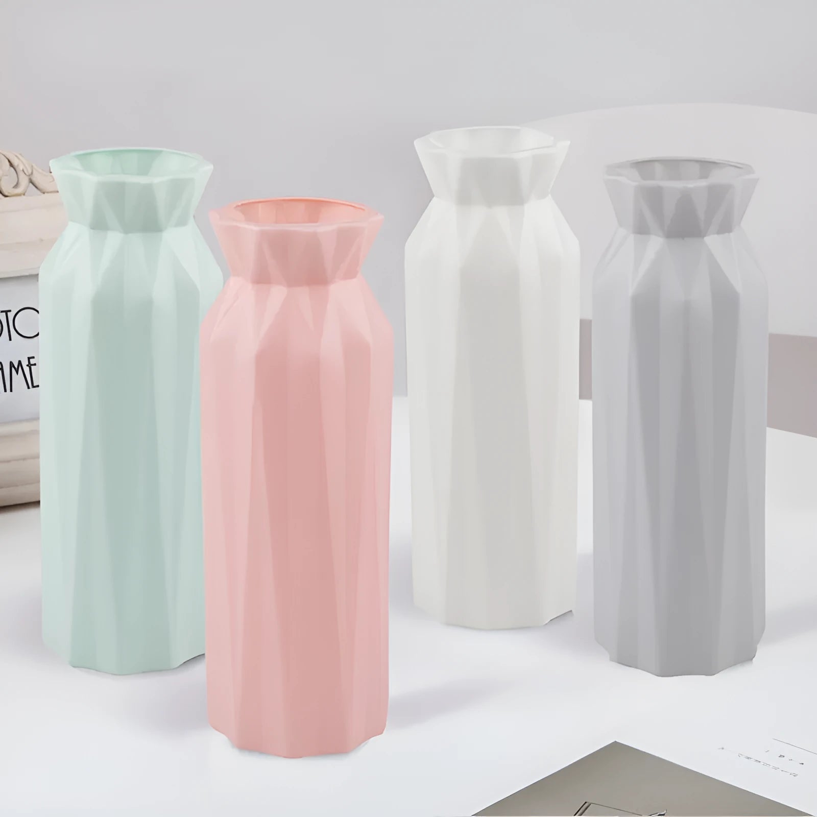 Green melamine drop-resistant vase with a 7.2cm base diameter on a desk.