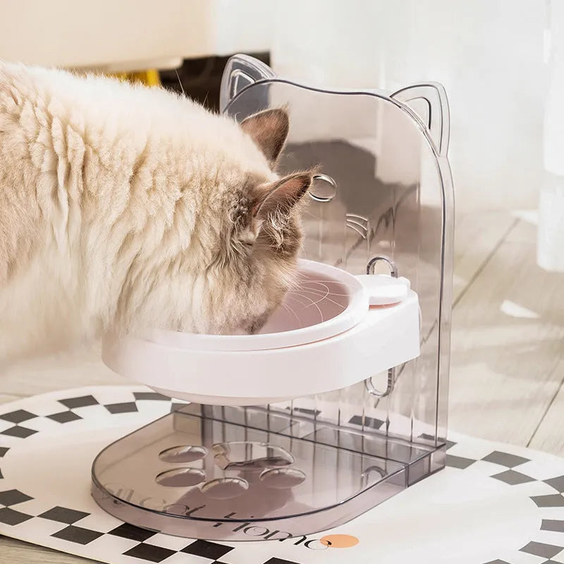 Grey cat food bowl with protective cat ear design around rim for neck protection during feeding