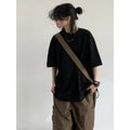 Men's short-sleeved crew neck t-shirt in black, loose fit, available in sizes M to 3XL