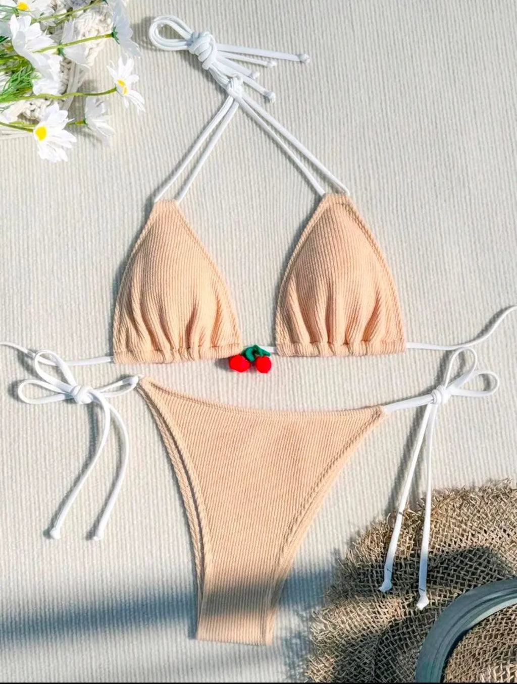 Solid colour nylon bikini briefs swimsuit in briefs style on a mannequin.