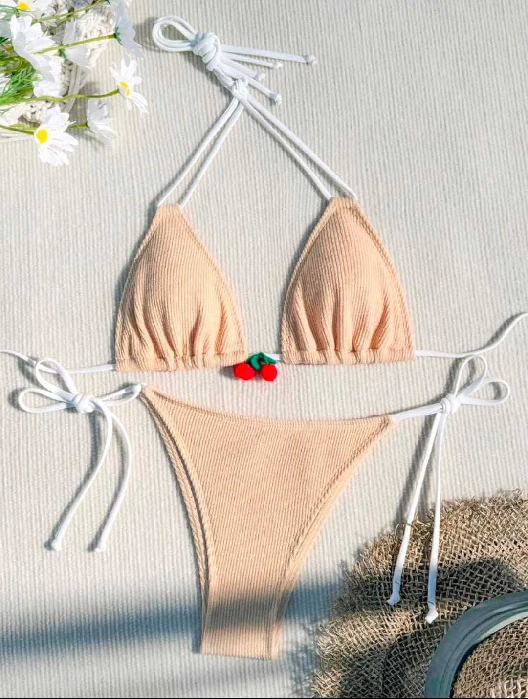 Solid colour nylon bikini briefs swimsuit in briefs style on a mannequin.