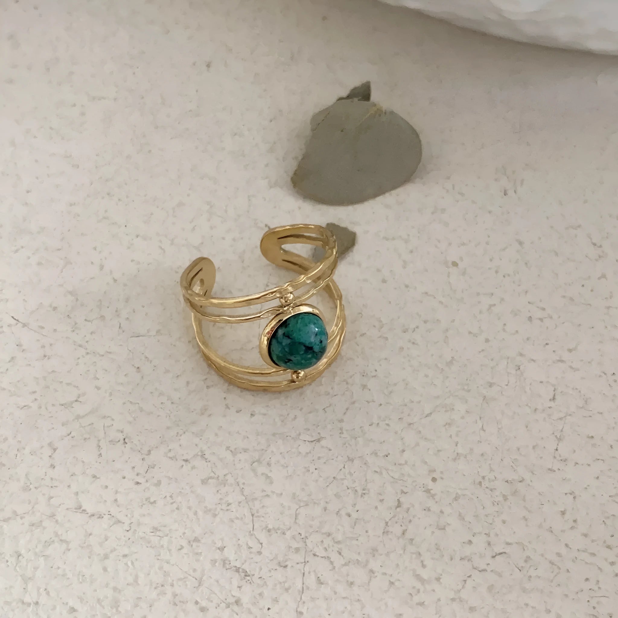 Geometric open ring with green natural stone centrepiece and titanium steel electroplated alloy band