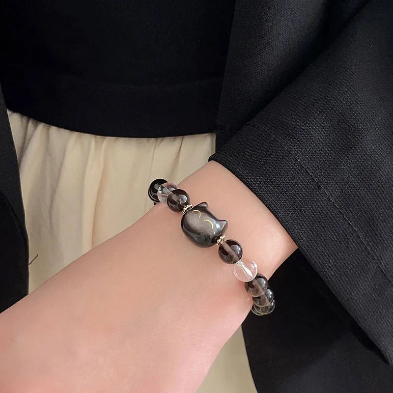 Women's cat head charm bracelet with 8mm Ice Stone on natural silver stone setting.