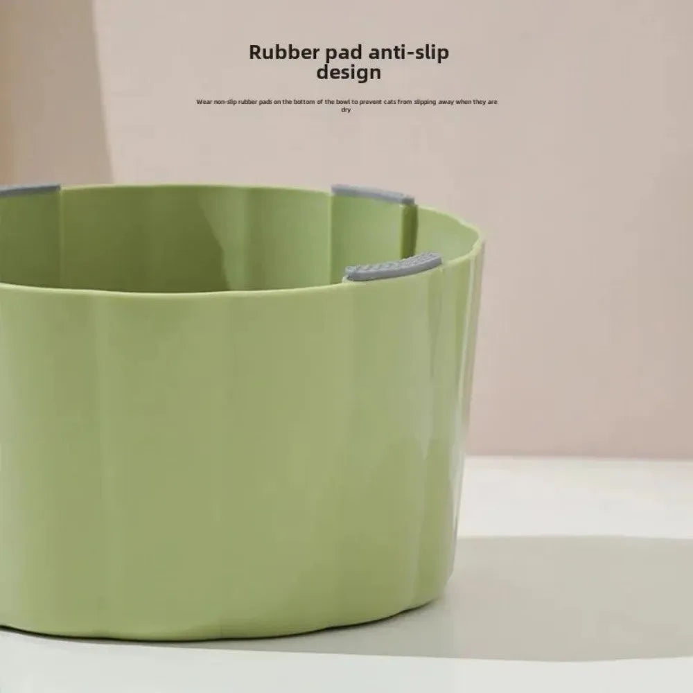 Dark green cat bowl with cactus design, showing wide mouth, heavy base, and anti-slip ring