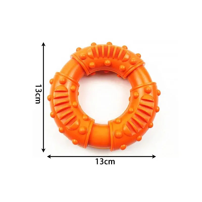 Blue hollow rubber dog fetching stick toy on grass, showing its lightweight, chewy design for catch and fetch games.