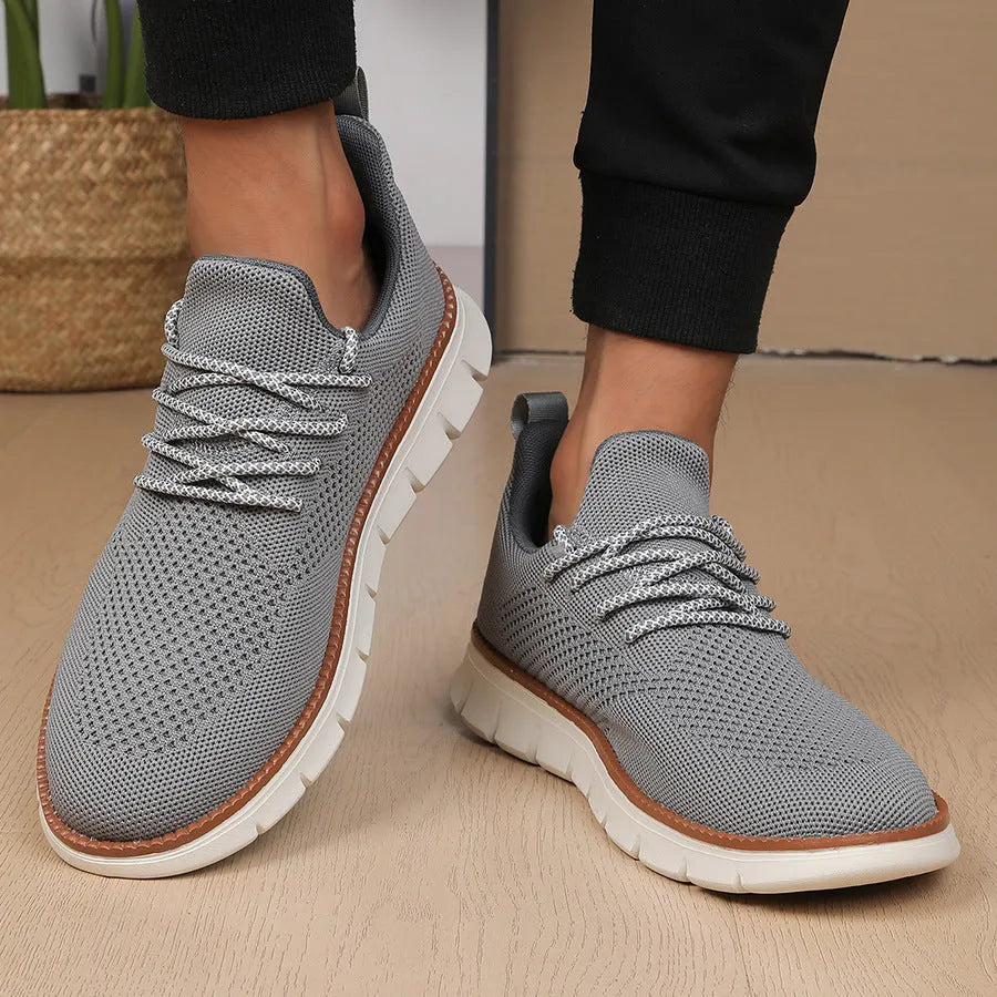 Men's grey mesh sneakers with round toe and shallow collar design