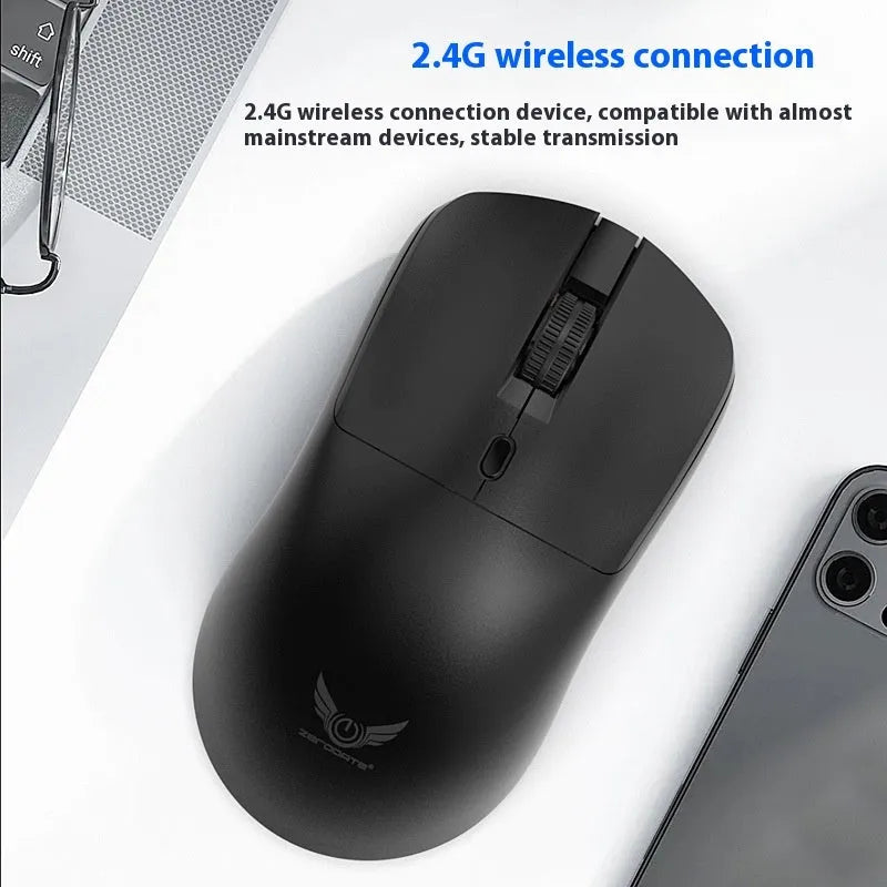 Black wireless computer mouse with a three-gear volume control button on the side.