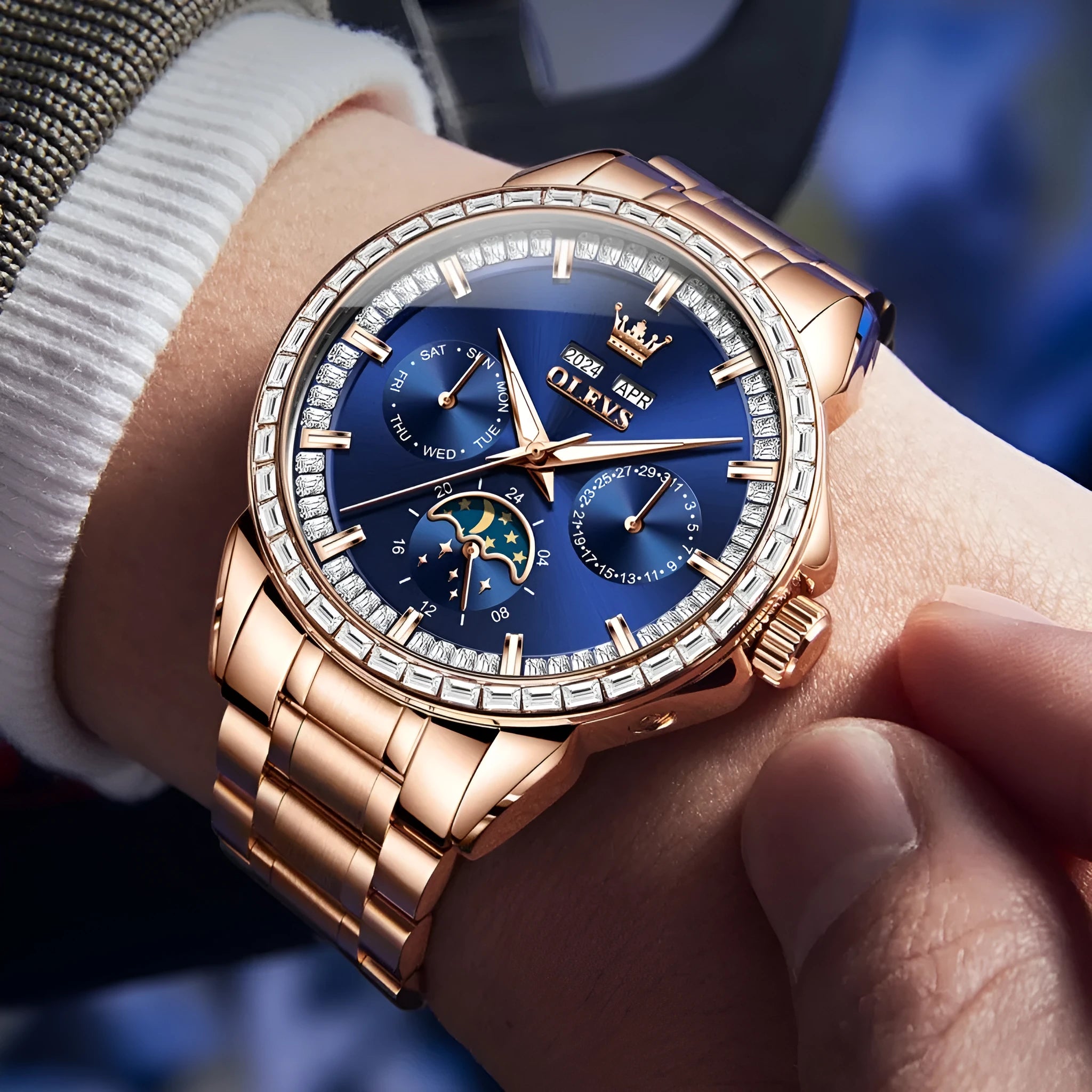 Men's stainless steel automatic chronograph watch with diamond dial and transparent case back.