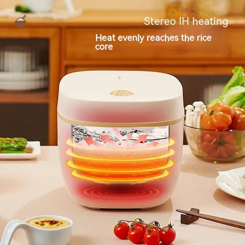 White or beige 3L rice cooker with black inner pot, rice scoop, measuring cup and steamer basket