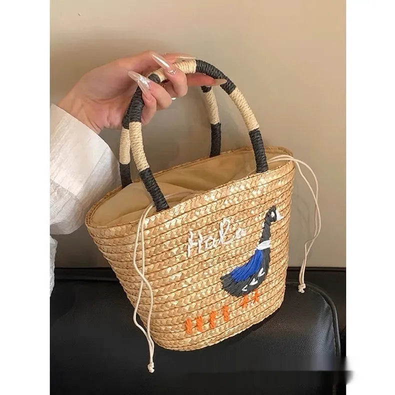 Women's hand-woven straw khaki tote bag with open outer pocket