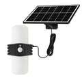 Black outdoor solar sensor floodlight with an abstraction design, shown with mounting bracket.