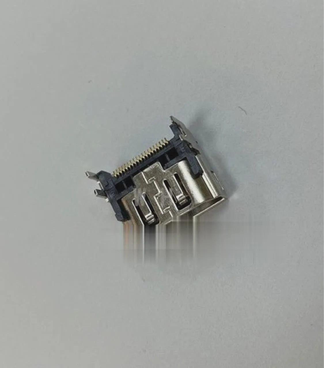 Silver HDMI interface host socket for gaming console and entertainment system repairs