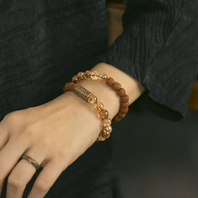Retro style double circle bracelet with LCD display in citrine colour, showing girls and boys sizing options