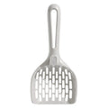Grey plastic cat litter scoop sitting in its matching base tray