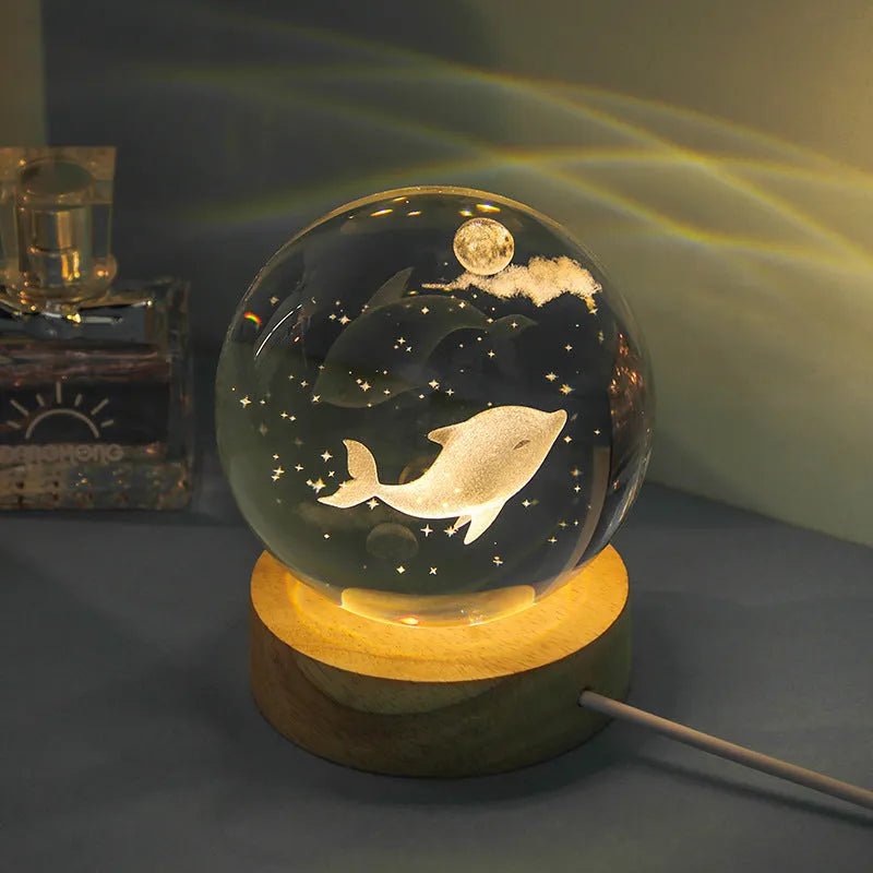 Transparent crystal ball night lamp with 3D carved jellyfish design, showing 6cm size on round base.
