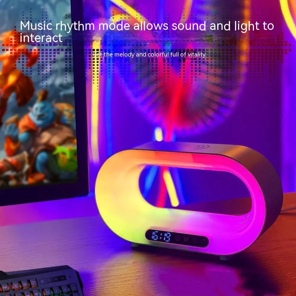 White 3-in-1 LED night light with wireless charging pad and alarm clock display