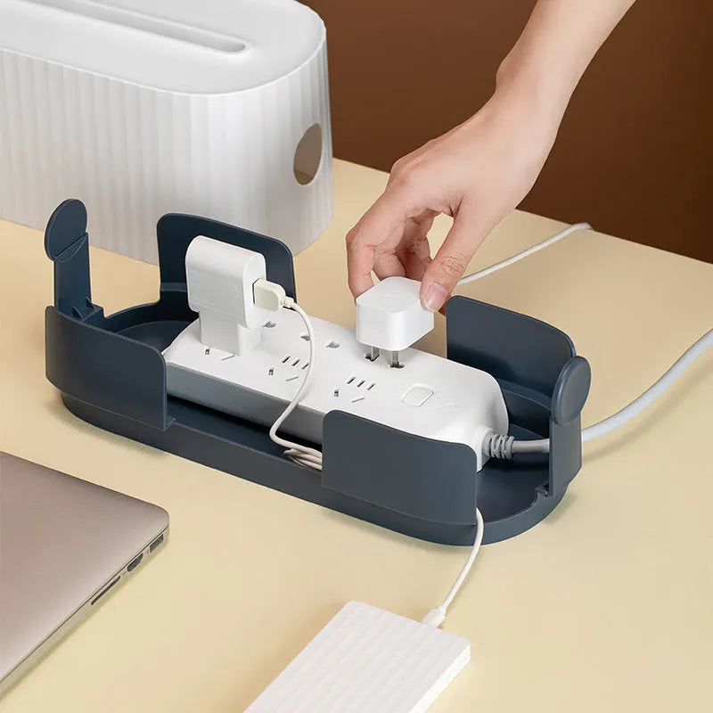 Blue and white desktop power strip storage organiser box with cable holes and a detachable cover.