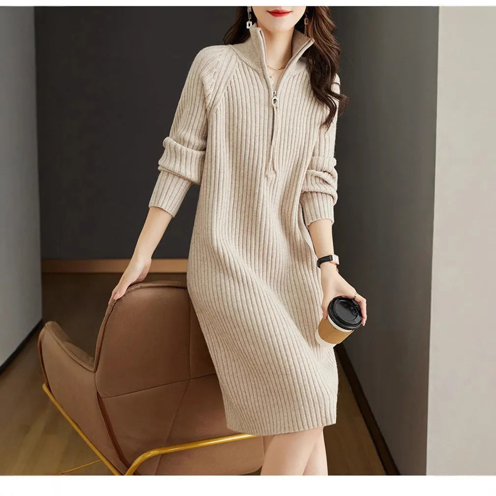 Beige woolen skirt with half zipper front, stand collar and loose long sleeves in straight dress silhouette