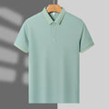 Men's summer polo shirt in polyester blend available in multiple colours including dark green and white