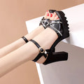 Women's black and white high heel sandals made from PU material, shown in available sizes 35-42.