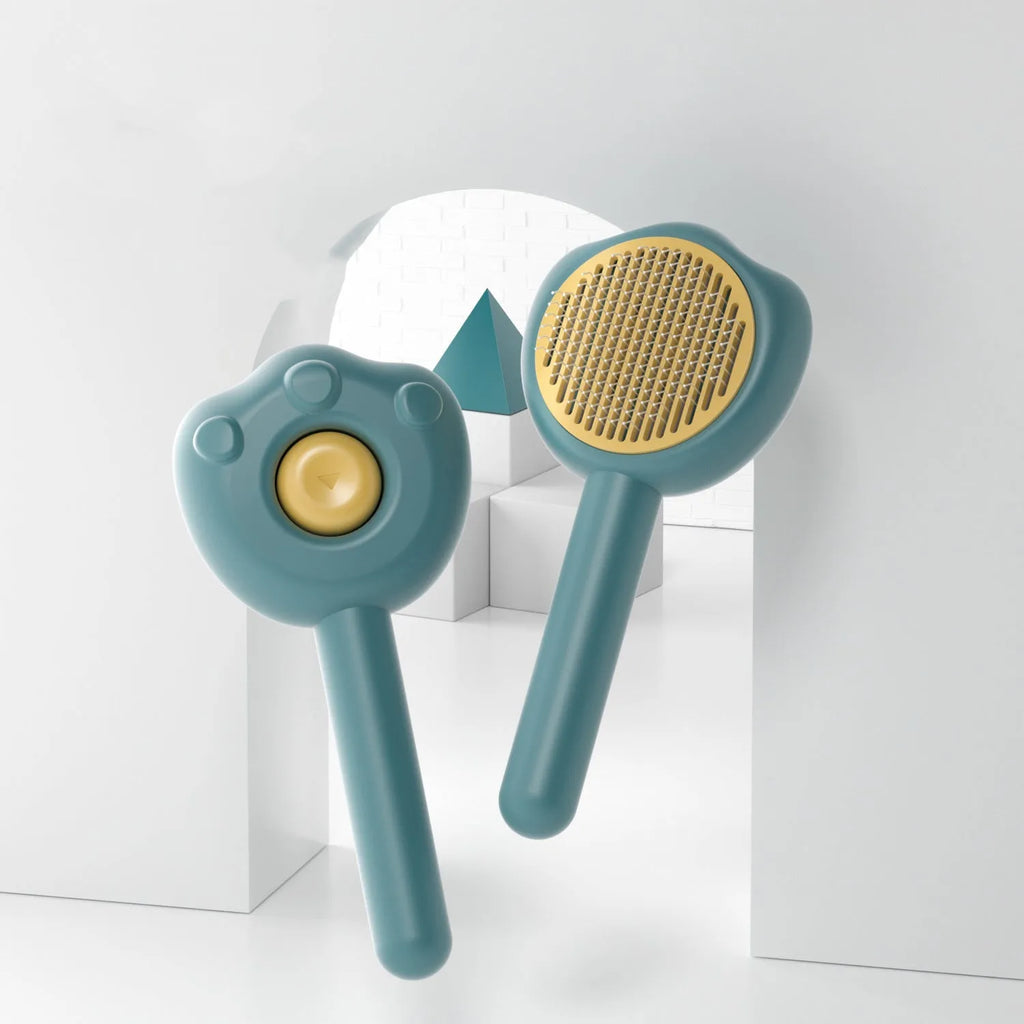 Self-cleaning pet grooming comb with needle teeth and colourful handle for cat coat maintenance
