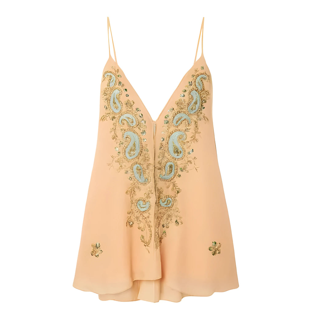 Light yellow women's ethnic print sleeveless skirt with V-neck and sling straps on a mannequin.