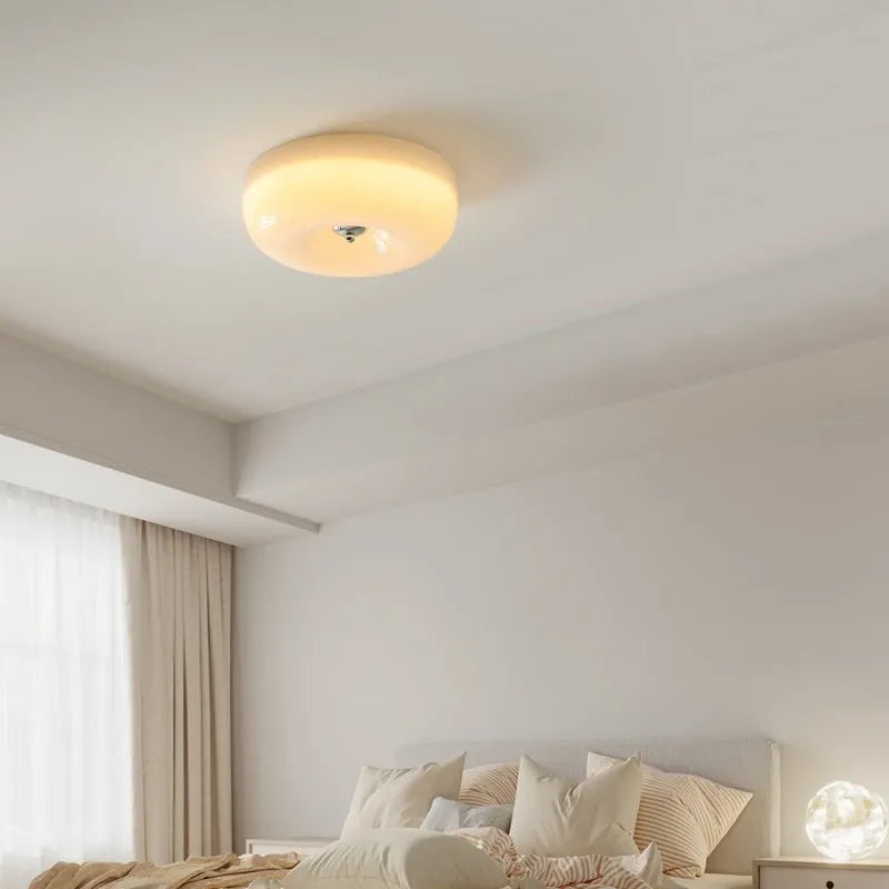 Cream coloured American antique style bedroom ceiling lamp with a three-colour light.