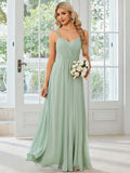 Women's sleeveless sling neck pleated dress in light green with A-line skirt for banquet events