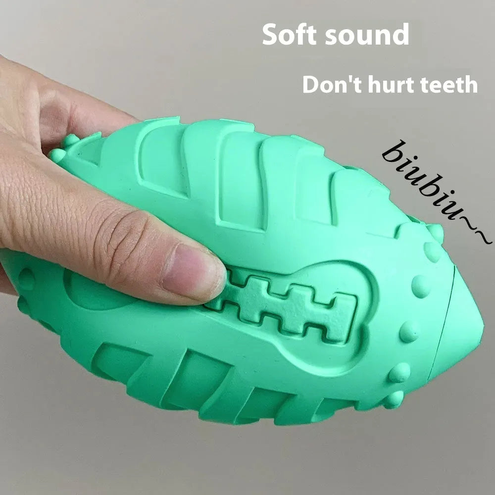 Bite-resistant rubber rugby dog toy in light green or blue with vocal features for interactive training