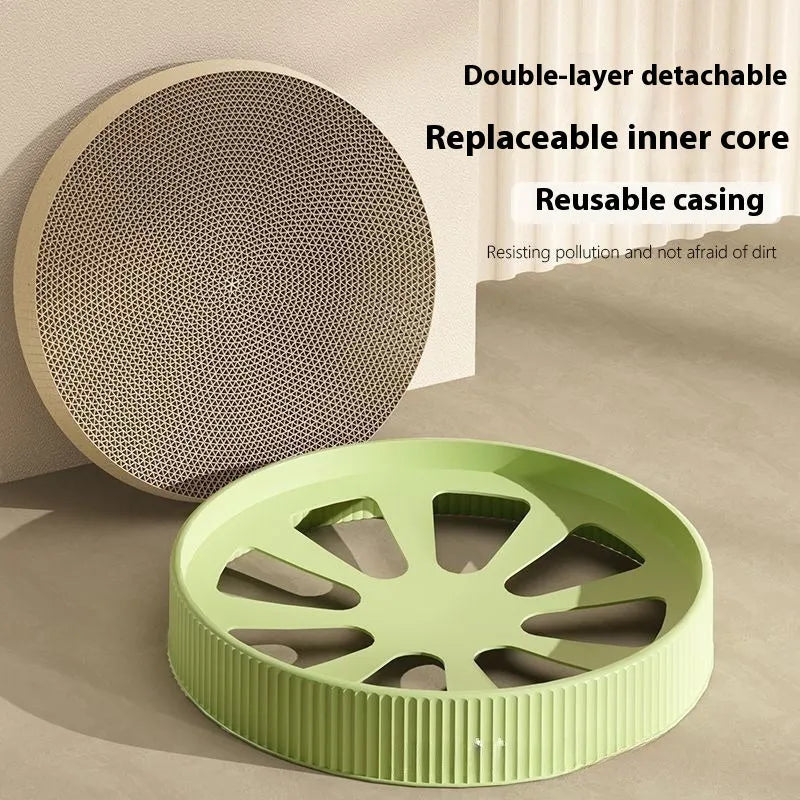 Round green and white corrugated paper cat scratching board and bed, 55cm diameter.