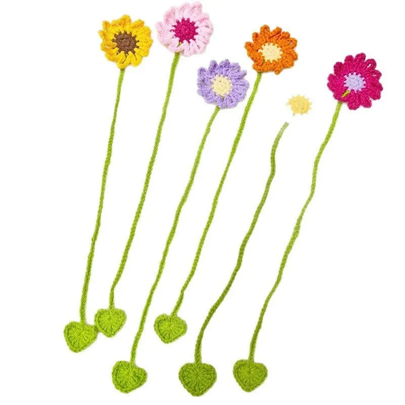 Hand-crocheted wool daisy bookmark with flexible wire construction in multiple colour options