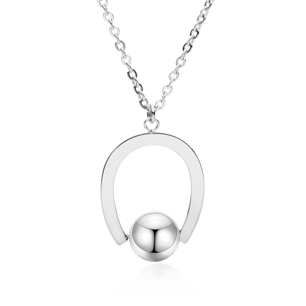 Gold stainless steel geometric pendant necklace on a cross chain, adjustable from 21cm to 50cm
