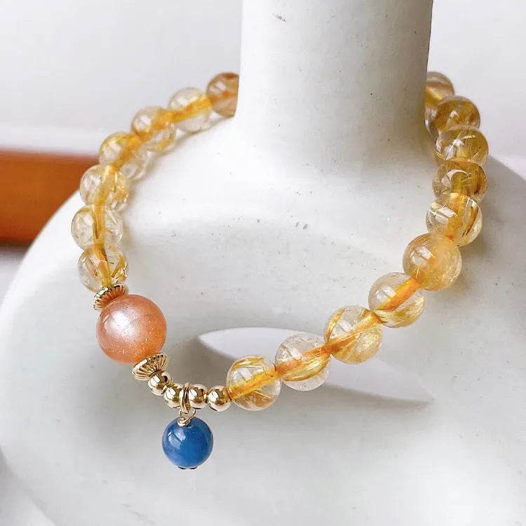 Natural gold rutilated quartz sunstone crystal bracelet with diamond-shaped beads for women