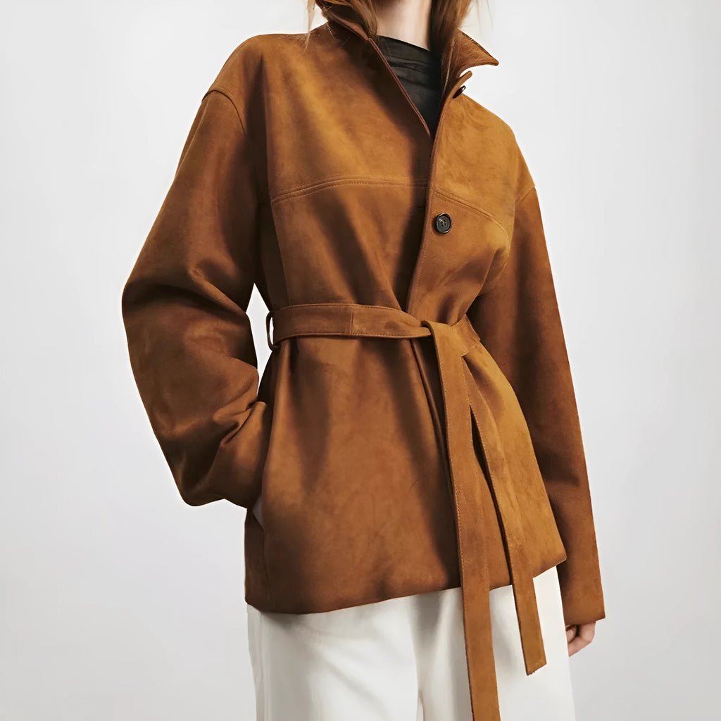 Women's Caramel Mocha cashmere coat with Peter Pan collar and leather stitching in a loose retro fit.