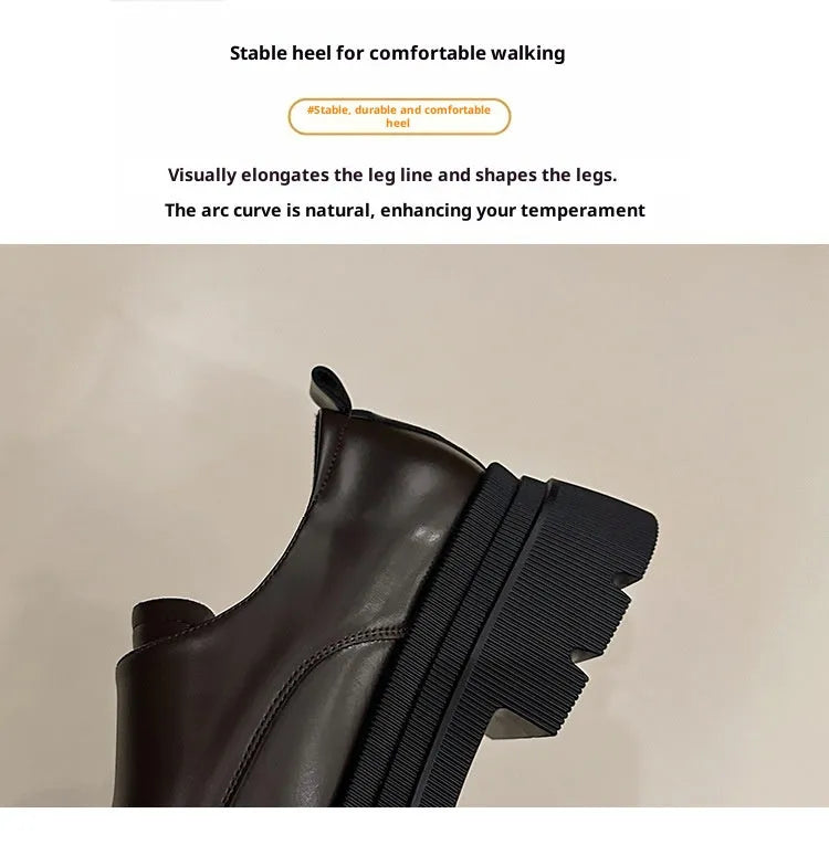 Women's black chunky heel shoes with low top, round toe, and cross strap detail on a white background