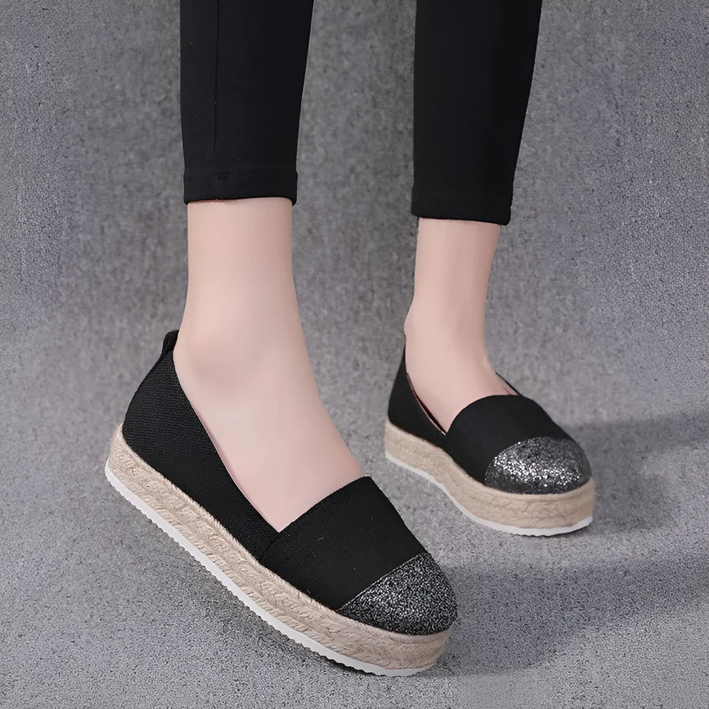 Black and Milky White plus-size canvas oversleeve shoe covers showing round toe design.
