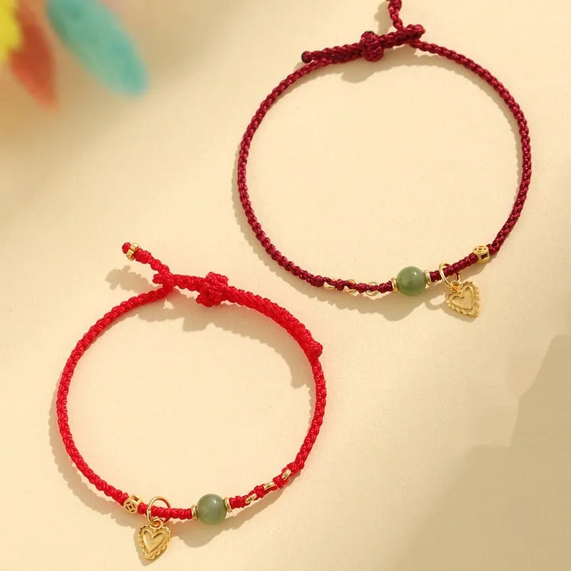 Women's handmade 925 silver and Hetian jade bracelet with adjustable woven cord strap