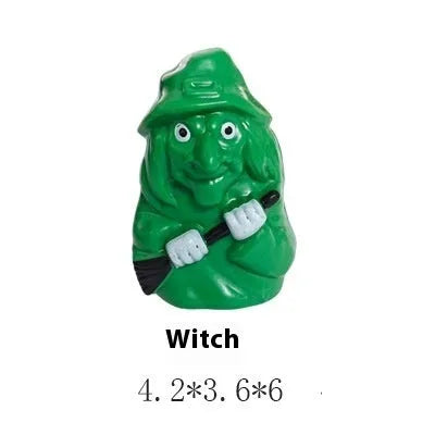 Plastic Halloween ornament of a witch green baby head for scene decoration