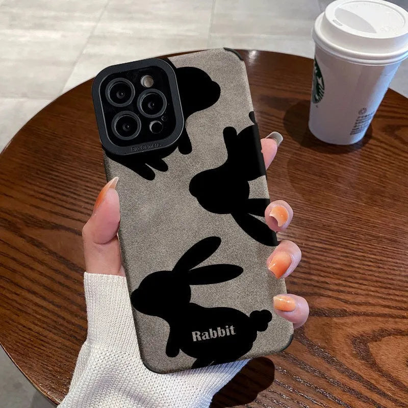 Cartoon creative TPU phone case for iPhone 11-14 Pro Max with black background and checkerboard bunny design